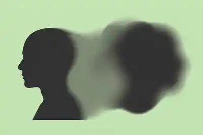Dark silhouette of a human head in profile on the left side facing right, with a blurred, abstract shadow shape extending to the right against a pale beige background